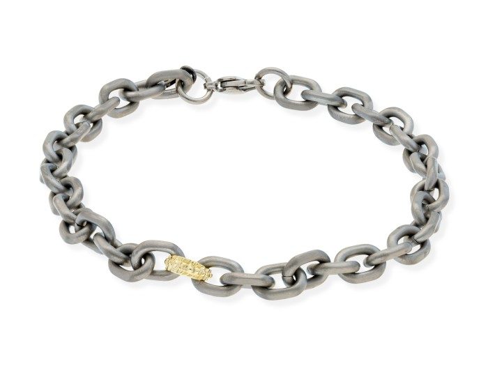 Pulsera de plata y oro amarillo con eslabón grande