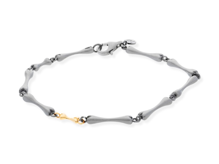 Pulsera de plata y oro amarillo huesitos