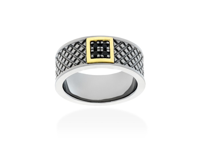 Anillo de plata y oro amarillo con diamantes negros