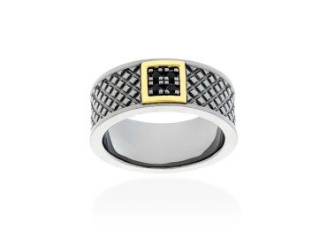 Anillo de plata y oro amarillo con diamantes negros