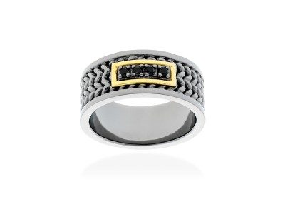 Anillo de plata y oro amarillo con diamante negro