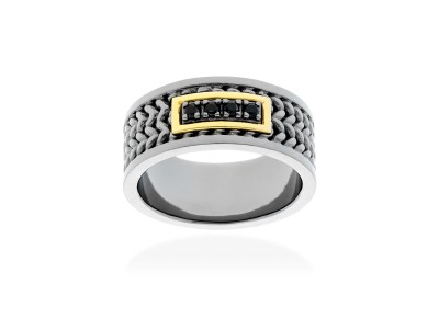 Anillo de plata y oro amarillo con diamante negro