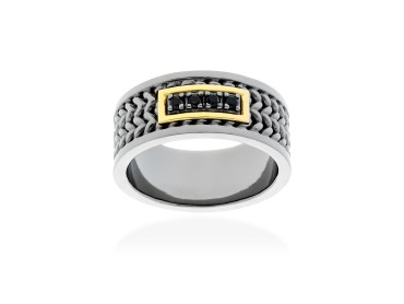 Anillo de plata y oro amarillo con diamante negro