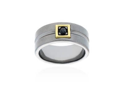 Anillo de plata y oro amarillo con diamante negro