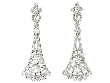  Pendientes   en Oro blanco 18Kt y diamantes