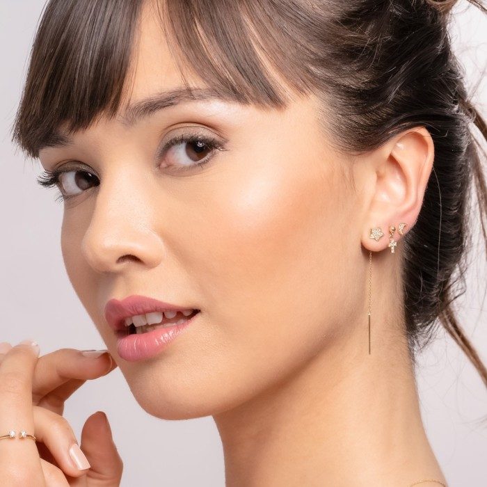 Piercing CRUZ in 18Kt yellow Gold and diamonds