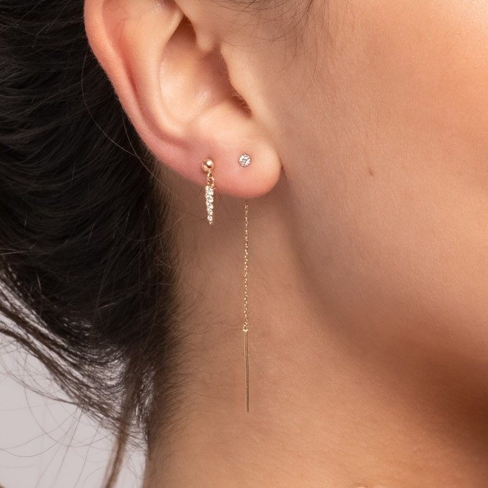 Piercing de Oro 18Kt largo con cadena y diamantes