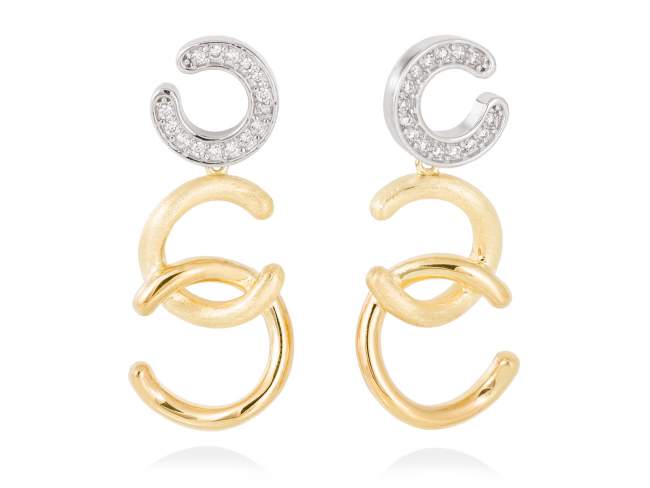 Earrings BORNEO white in golden silver de Marina Garcia Joyas en plata Earrings in 18kt yellow gold and rhodium plated 925 sterling silver with white cubic zirconia. (size: 3,5 cm.)