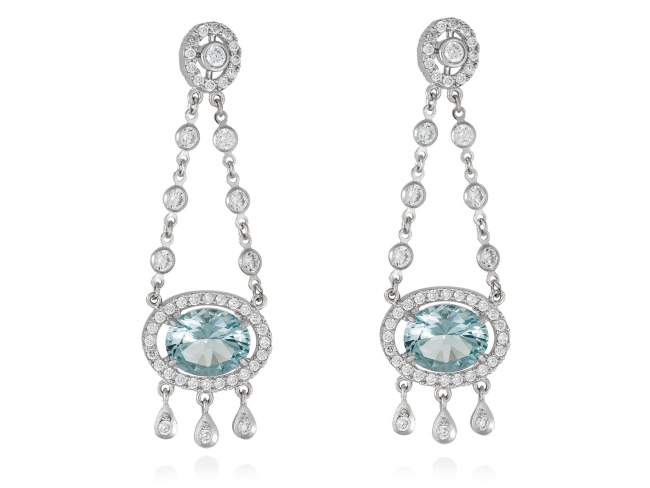 Earrings DULCE Blue in silver de Marina Garcia Joyas en plata Earrings in rhodium plated 925 sterling silver, white cubic zirconia and synthetic stone in aquamarine color. (length: 5,5 cm.)