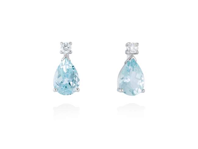 Earrings in 18kt. Gold and diamonds de Marina Garcia Joyas en plata Earrings in rodhium plated 18kt white gold with 2 diamonds carat total weight 0.06 (Color: Top Wesselton (G) Clarity: SI) and faceted aquamarine.