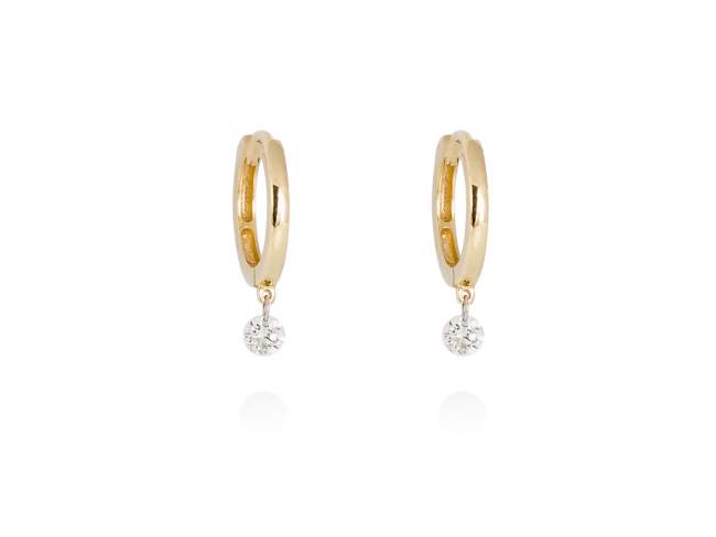 Earrings   in 18kt. Gold and diamonds de Marina Garcia Joyas en plata Earrings in 18kt yellow gold with 2 diamonds carat total weight 0.14 with a laser drill on bezel facet. (external diameter: 1 cm.)