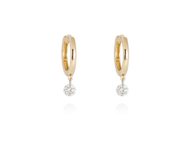 Earrings   in 18kt. Gold and diamonds de Marina Garcia Joyas en plata Earrings in 18kt yellow gold with 2 diamonds carat total weight 0.20 with a laser drill on bezel facet. (external diameter: 1 cm.)