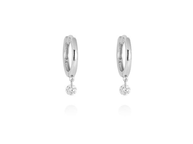 Earrings   in 18kt. Gold and diamonds de Marina Garcia Joyas en plata Earrings in rodhium plated 18kt white gold with 2 diamonds carat total weight 0.14 with a laser drill on bezel facet. (external diameter: 1 cm.)