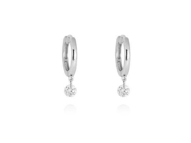 Earrings   in 18kt. Gold and diamonds de Marina Garcia Joyas en plata Earrings in rodhium plated 18kt white gold with 2 diamonds carat total weight 0.20with a laser drill on bezel facet. (external diameter: 1 cm.)