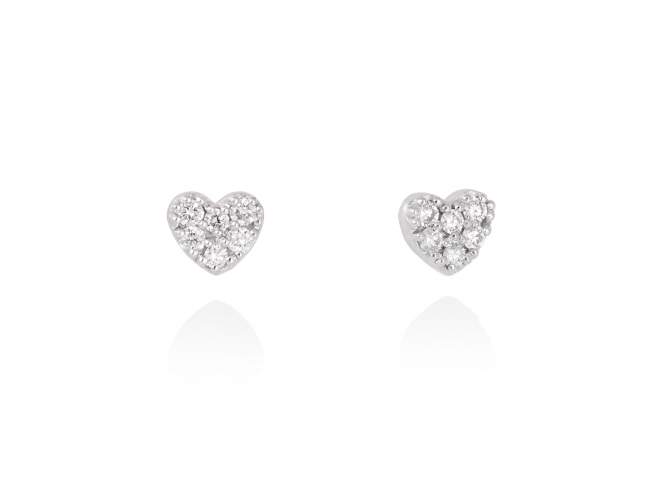 Earrings   in 18kt. Gold and diamonds de Marina Garcia Joyas en plata Earrings in rodhium plated 18kt white gold with 12 diamonds carat total weight 0.12 (Color: Top Wesselton (G) Clarity: SI).(size: 0,5 cm.)