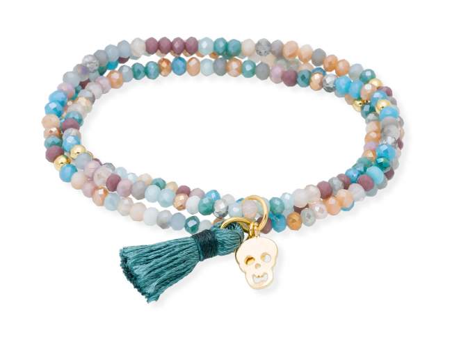 Bracelet ZEN OCEANIA with skull charm de Marina Garcia Joyas en plata Bracelet in 925 sterling silver plated with 18kt yellow gold, with elastic silicone band and faceted strass glass, with skull charm. Medium size 17 cm. (51 cm total)