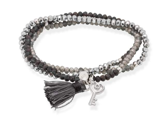 Bracelet ZEN CARBÓN with key charm de Marina Garcia Joyas en plata Bracelet in 925 sterling silver rhodium plated, with elastic silicone band and faceted strass glass, with key charm. Medium size 17 cm. (51 cm total)