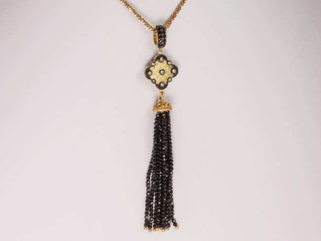 Pendant NOIR Black in golden Silver de Marina Garcia Joyas en plata Pendant in 18kt yellow gold plated 925 sterling silver with synthetic black spinel, white cubic zirconia and faceted black spinels.  (Chain is not included)
