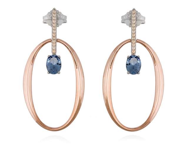 Earrings SAN REMO Blue in rose silver de Marina Garcia Joyas en plata Earrings in 18kt rose gold and rhodium plated 925 sterling silver, cognac cubic zirconia and synthetic stone in blue color. (size: 5,5 cm.)