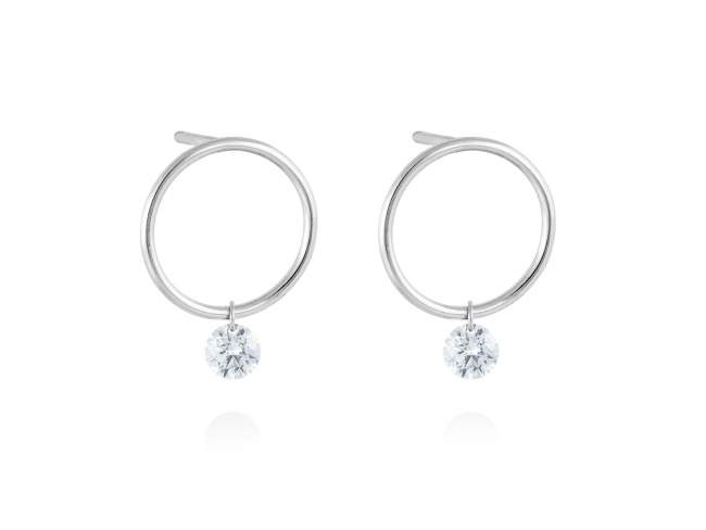 Earrings in 18kt. Gold and diamonds de Marina Garcia Joyas en plata Earrings in rodhium plated 18kt white gold with 2 diamonds carat total weight 0.20  with a laser drill on bezel facet.